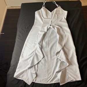 Size large, white and blue stripes high low women’s blouse.